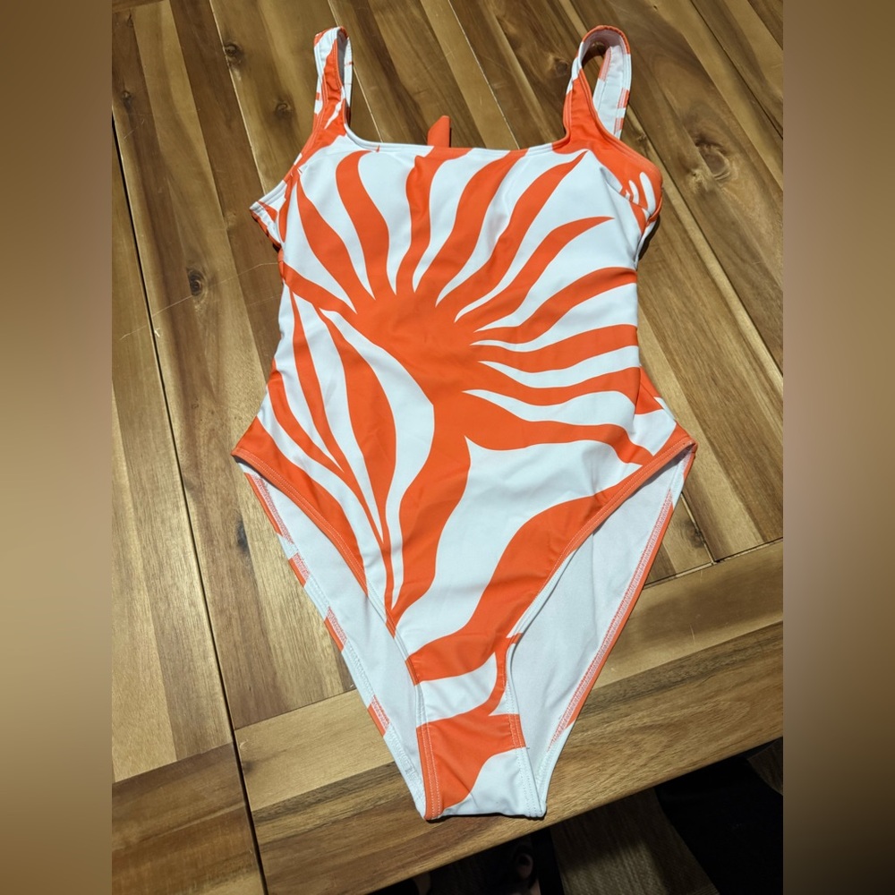 NWT orange and white floral one piece swim suits